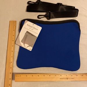 Tablet or mini laptop notebook sleeve with strap.